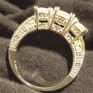 CZ / 3 CIRCLE CUT STONE AND STERLING SILVER ANNIVERSARY RING